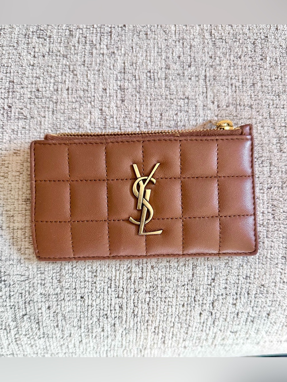 Brown Saint Laurent Cassandre card holder features quilted leather bronze